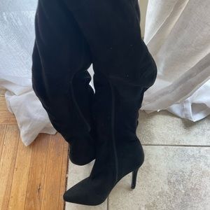 Women’s over the knee black boots.